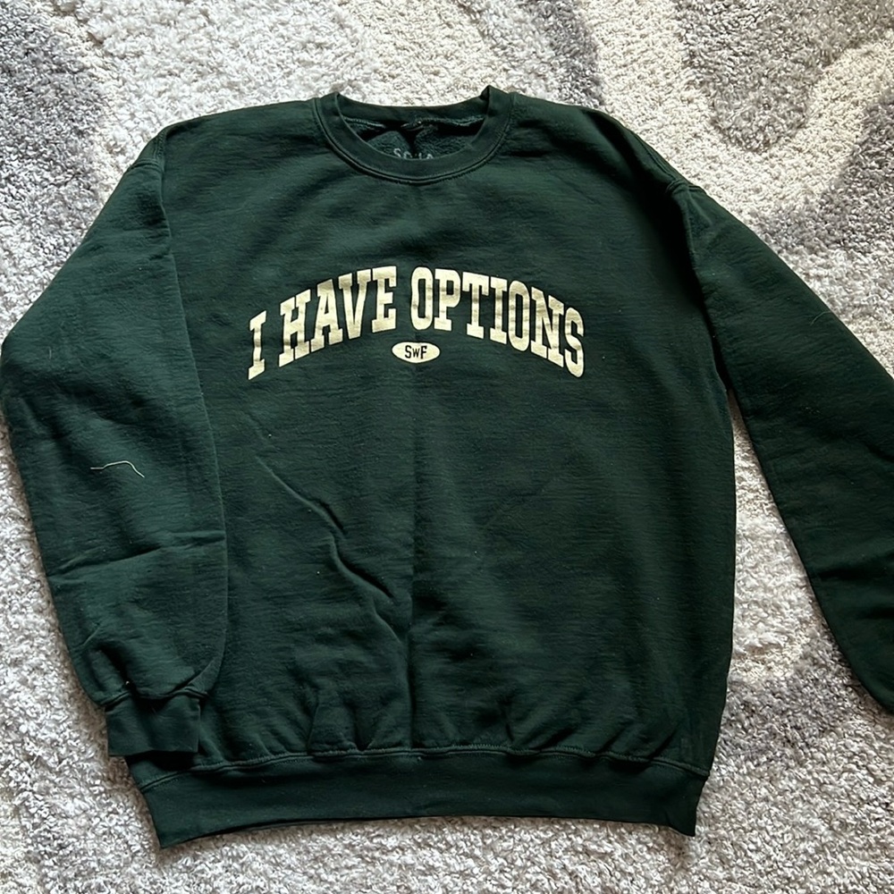 Sofia with an F crewneck